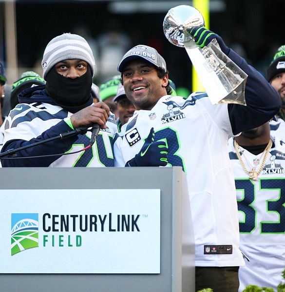 Russell Wilson and Marshawn Lynch celebrating the Super Bowl XLVIII victory in Seattle, 02.05.2014 - Wikimedia Commons