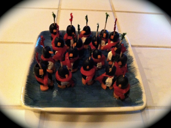 Black olive, cream cheese penguin appetizers, New Year's eve